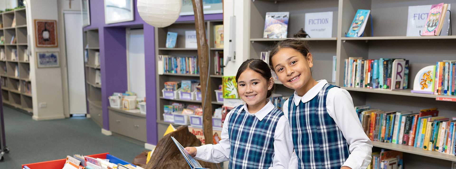 Holy Family Primary Emerton students in school library