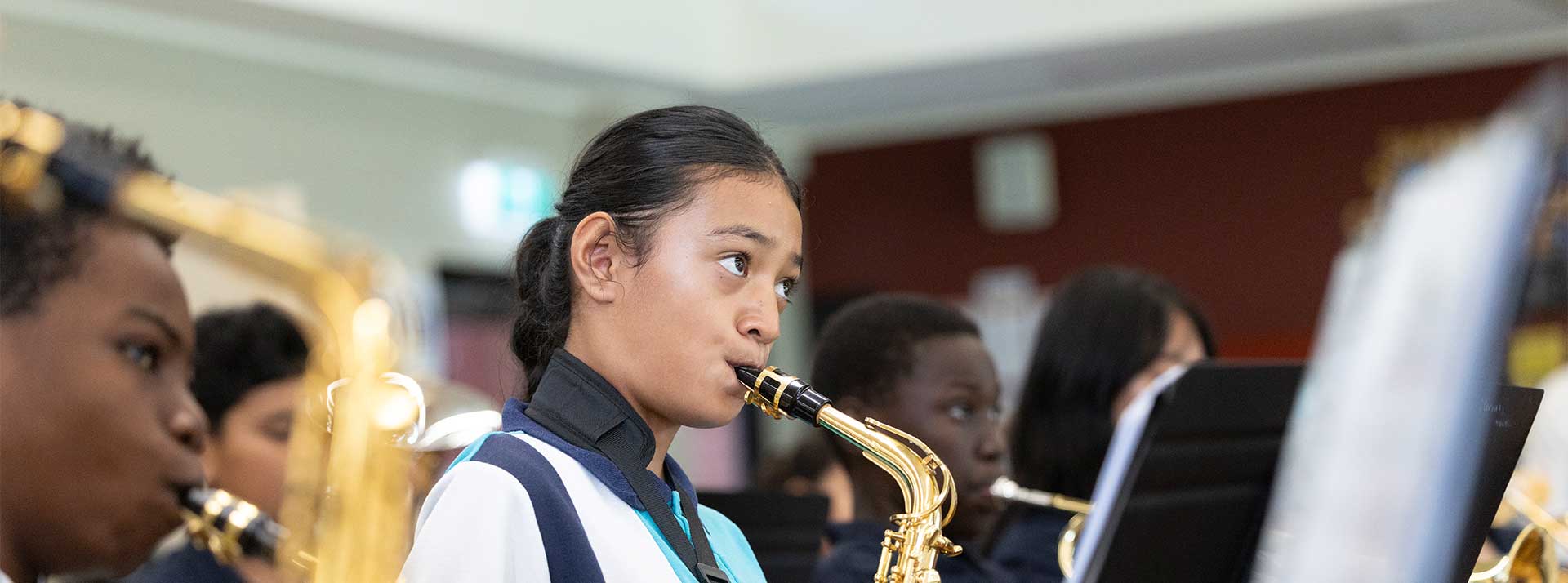 Holy Family Primary student playing Saxaphone