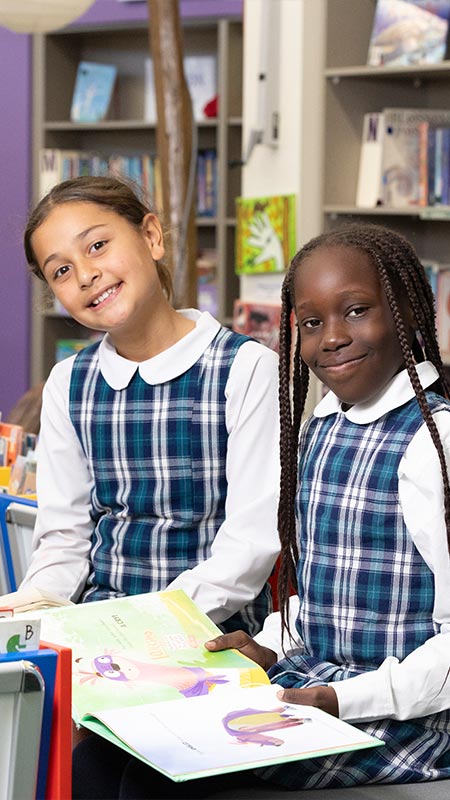 Holy Family Primary Emerton students in library