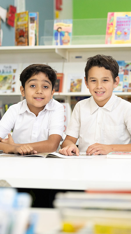 Students reading in Holy Family Emerton School Library