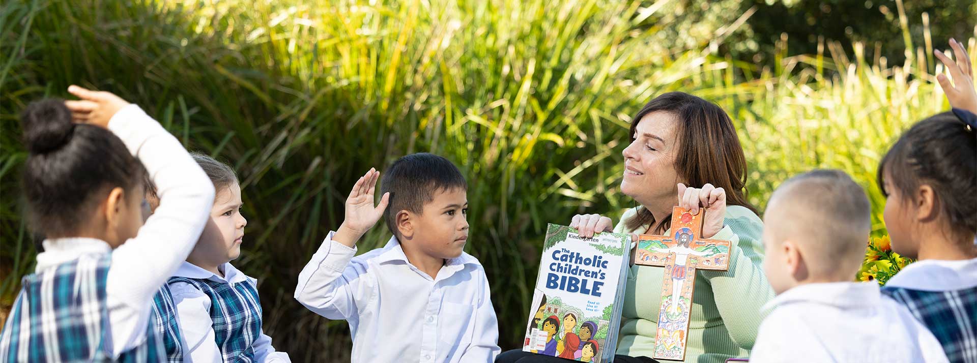 Students in prayer circle at Holy Family Primary Emerton