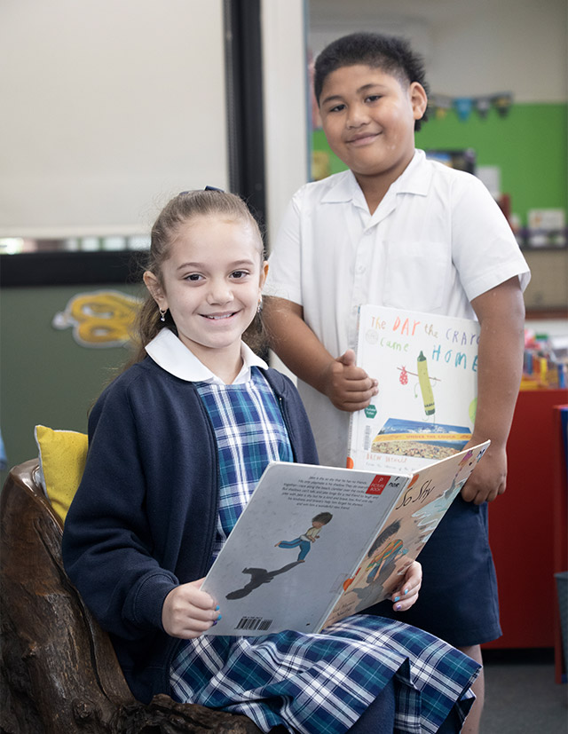 Students reading in Holy Family Emerton School Library