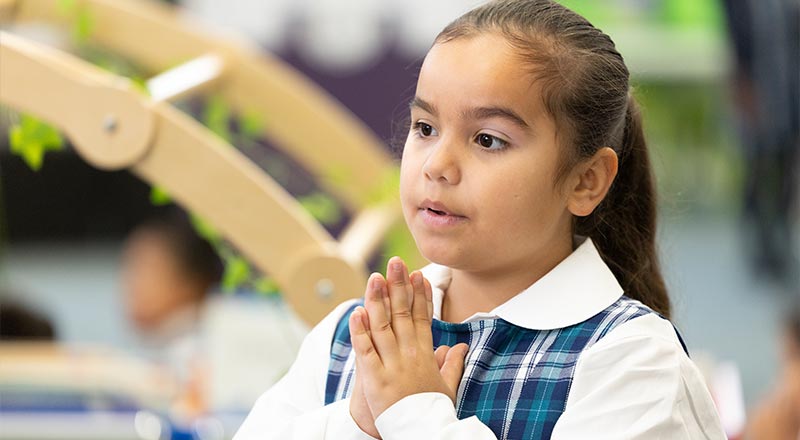 Holy Family Primary Emerton student praying