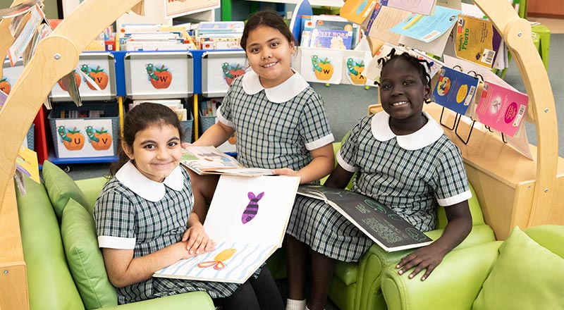 Students reading in Holy Family Emerton School Library