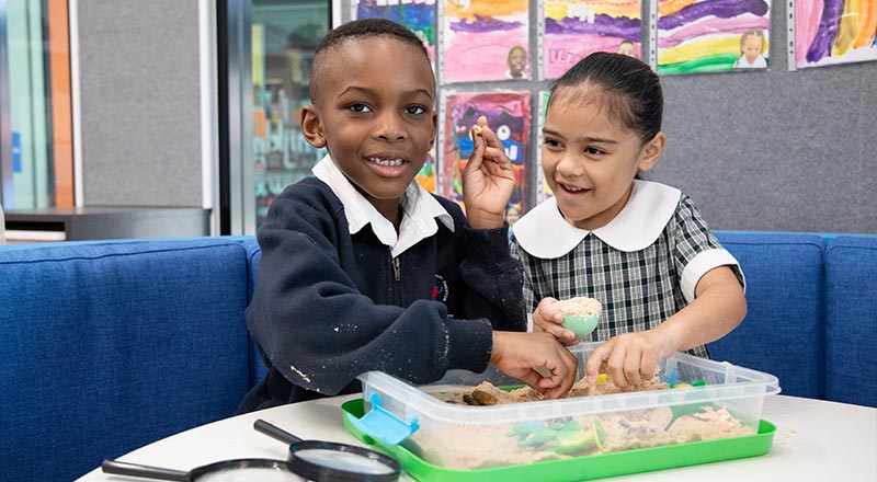 Holy Family Emerton boy and girl in class