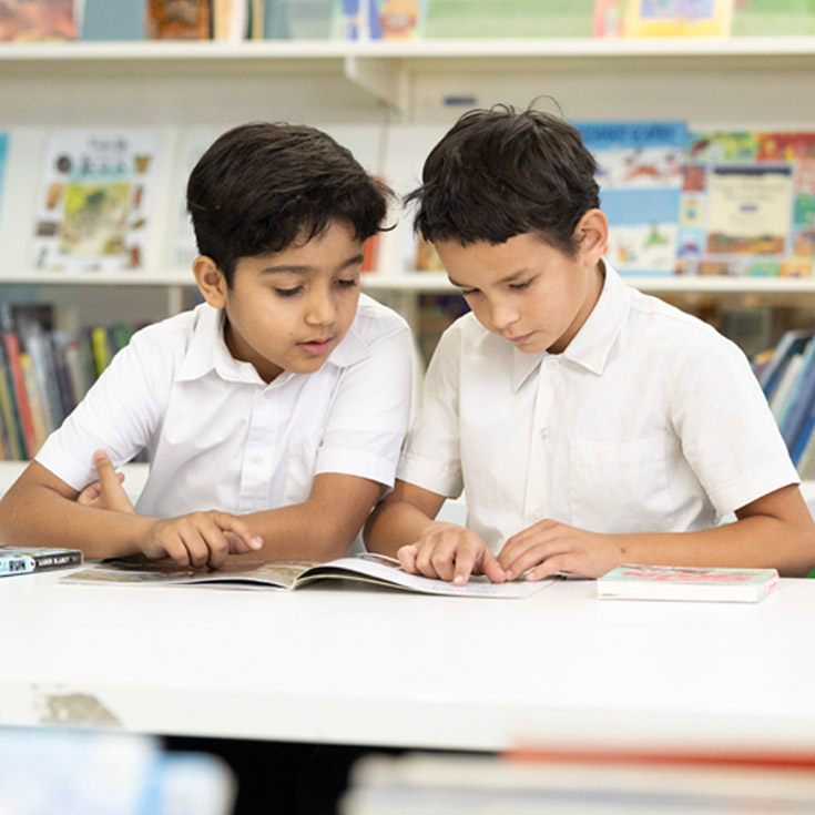 Holy Family Primary Emerton students in school library