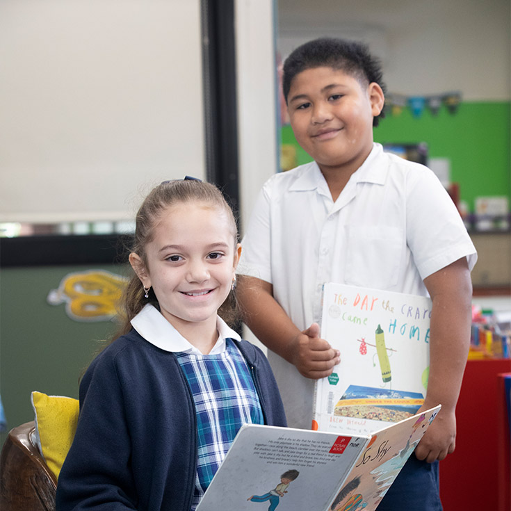 Students reading in Holy Family Emerton School Library
